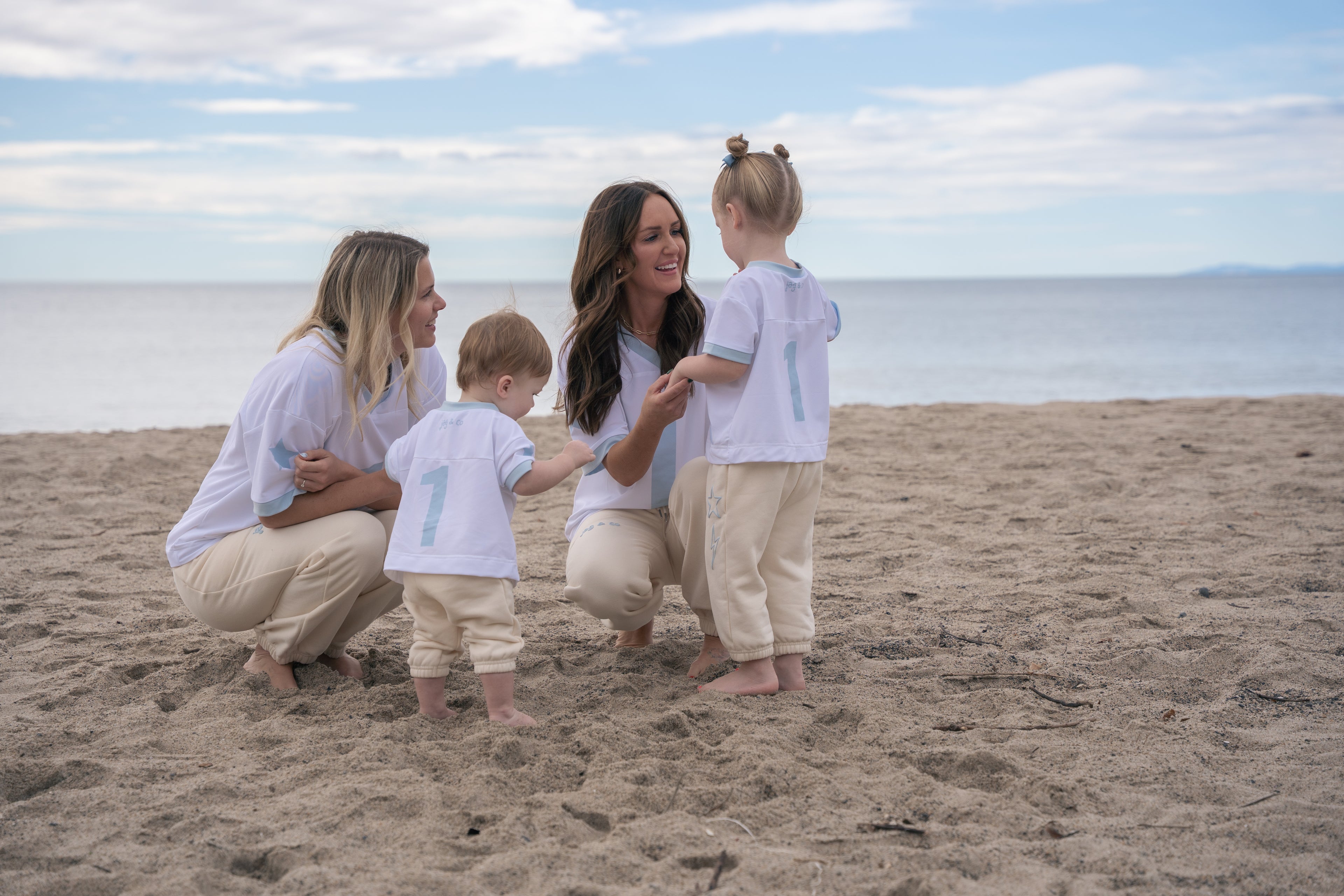 Two moms with their kids on beach